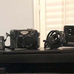 Nikon Coolpix 5400 w Charger,4 Compact Flash Cards $40
or best offer
